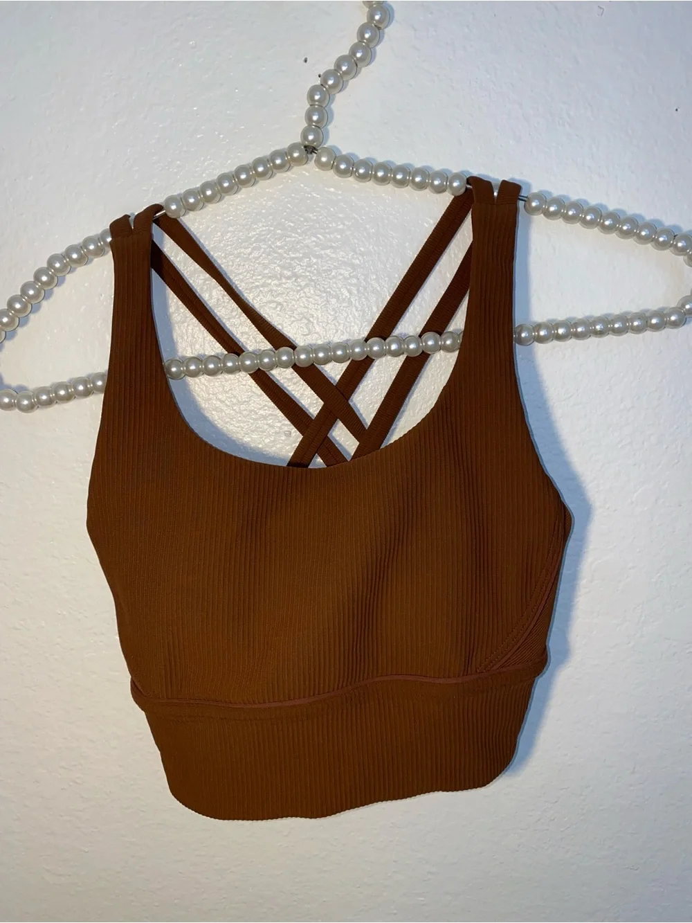 Lululemon brown ribbed sports bra with criss-cross back detail, size 4